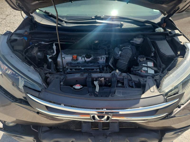 Photo 12 from auction – 2014 HONDA CR -V with VIN 2HKRM3H77EH533228