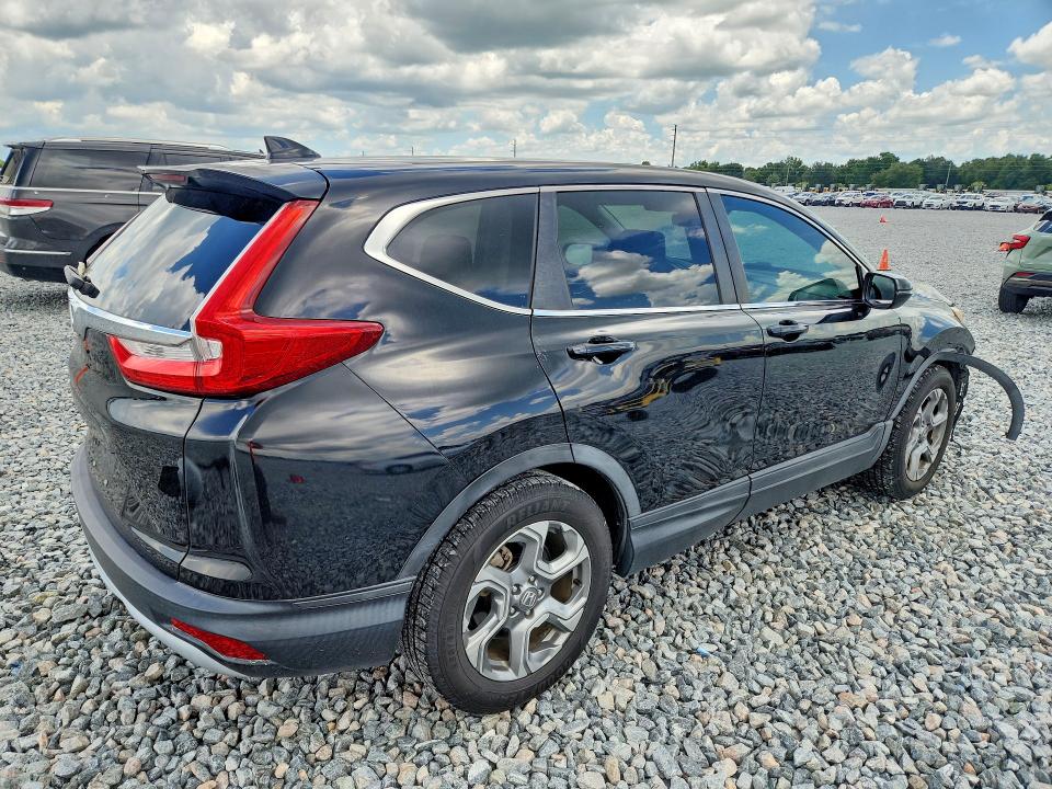 Photo 3 from auction – 2018 HONDA CR-V with VIN 7FARW1H51JE040459