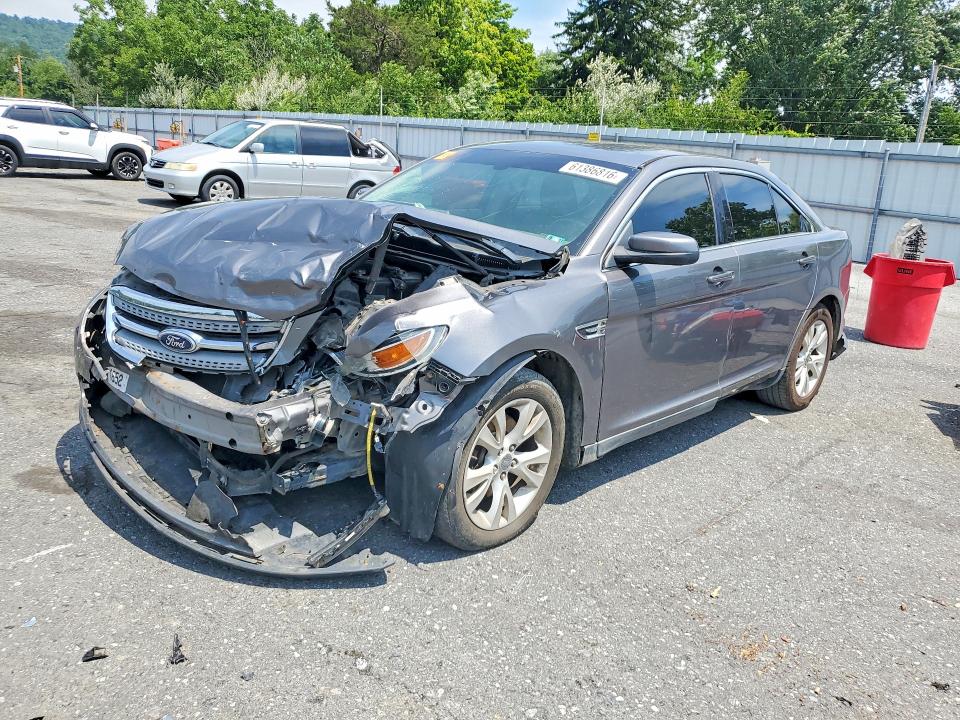 FORD TAURUS 2011 with VIN 1FAHP2EWXBG112313 - Photo from auction