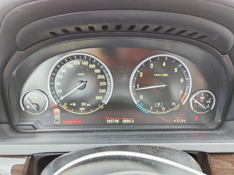 Photo 9 from auction – 2012 BMW 750 with VIN WBAKC6C57CC395577