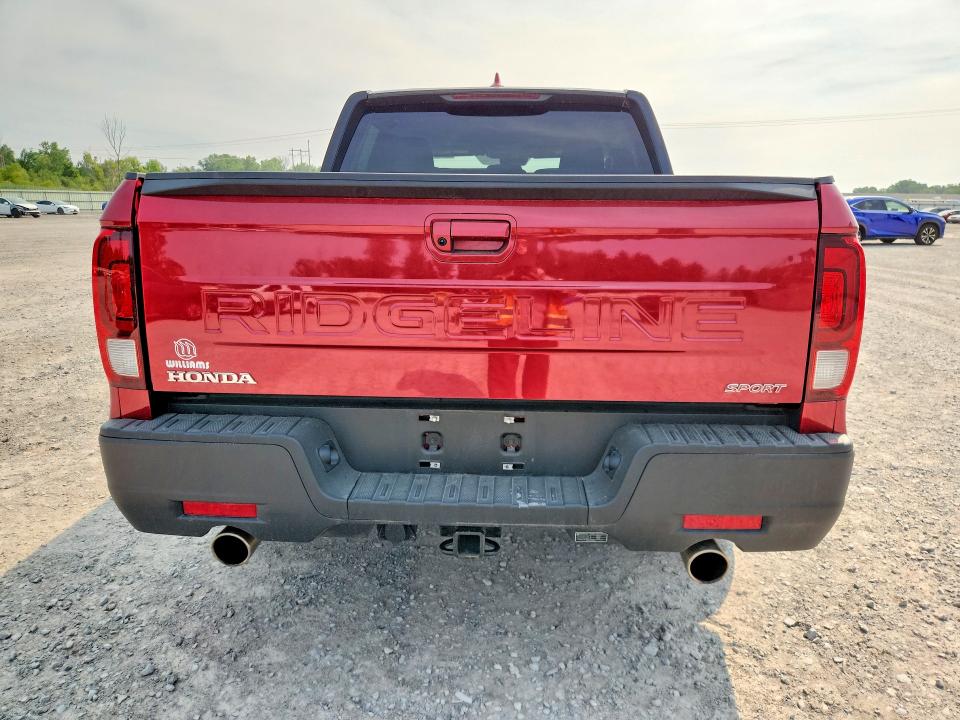 Photo 6 from auction – 2025 HONDA RIDGELINE with VIN 5FPYK3F11SB030909