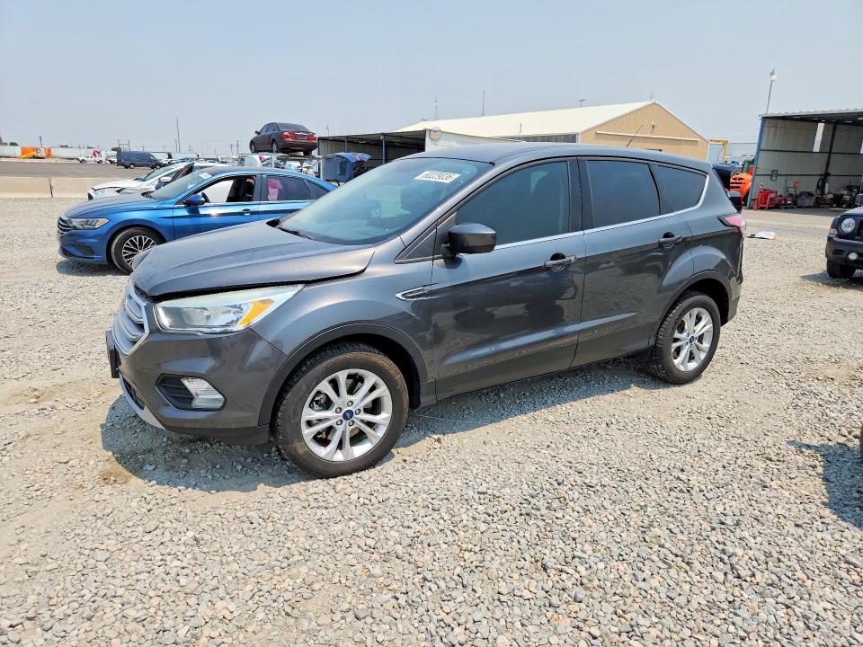 FORD ESCAPE 2017 with VIN 1FMCU9GD8HUE72865 - Photo from auction