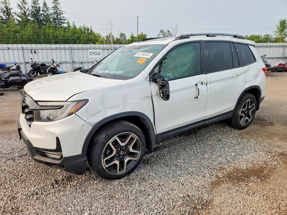 HONDA PASSPORT 2022 with VIN 5FNYF8H98NB501102 - Photo from auction