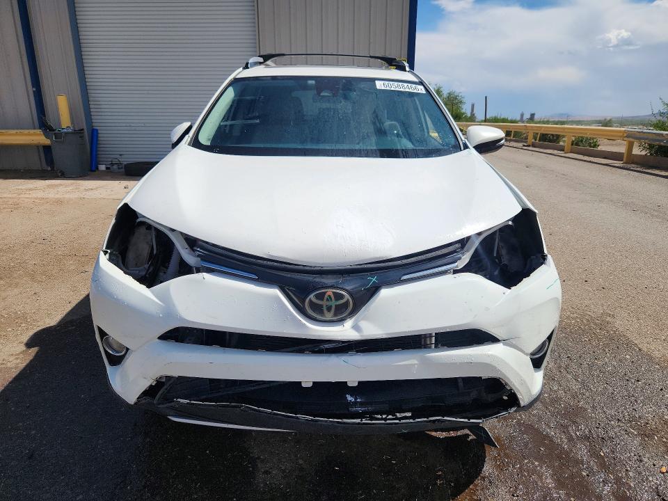 Photo 5 from auction – 2017 TOYOTA RAV4 with VIN JTMWFREV1HJ105881