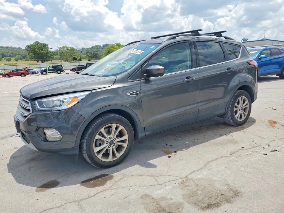 FORD ESCAPE 2018 with VIN 1FMCU9HD0JUC87231 - Photo from auction