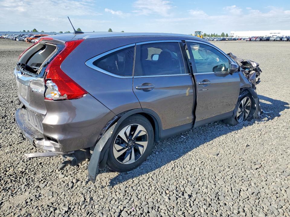 Photo 3 from auction – 2016 HONDA CR-V with VIN 5J6RM4H90GL133995