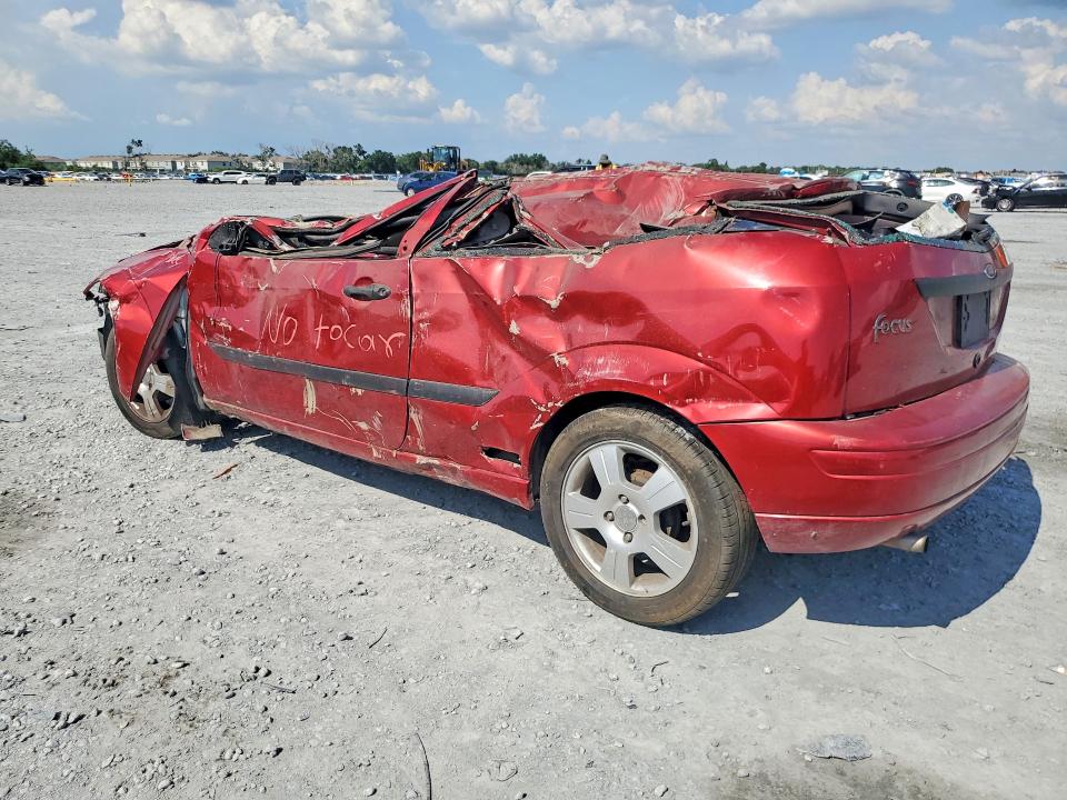 Photo 2 from auction – 2004 FORD FOCUS with VIN 3FAFP31Z24R103937