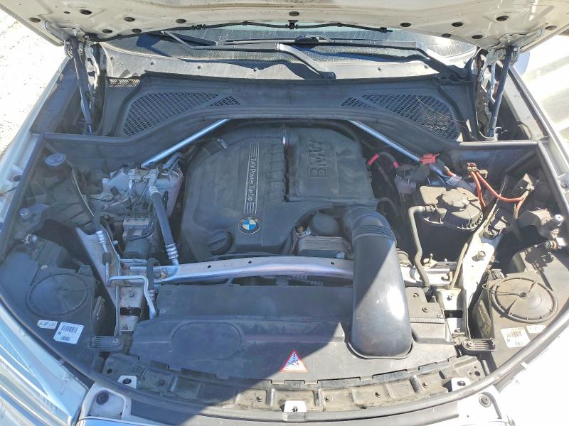 Photo 12 from auction – 2014 BMW X5 with VIN 5UXKR0C5XE0H24325