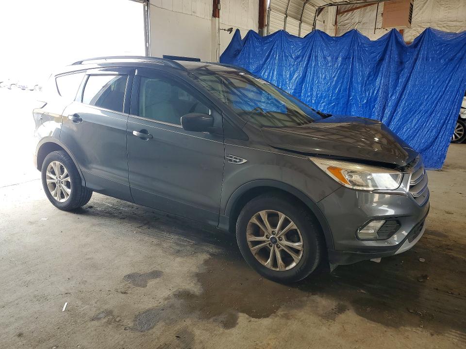 Photo 4 from auction – 2018 FORD ESCAPE with VIN 1FMCU9GD2JUB59686