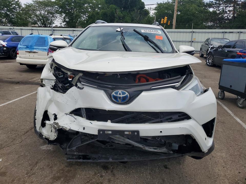 Photo 5 from auction – 2018 TOYOTA RAV4 HV with VIN JTMDJREVXJD187216