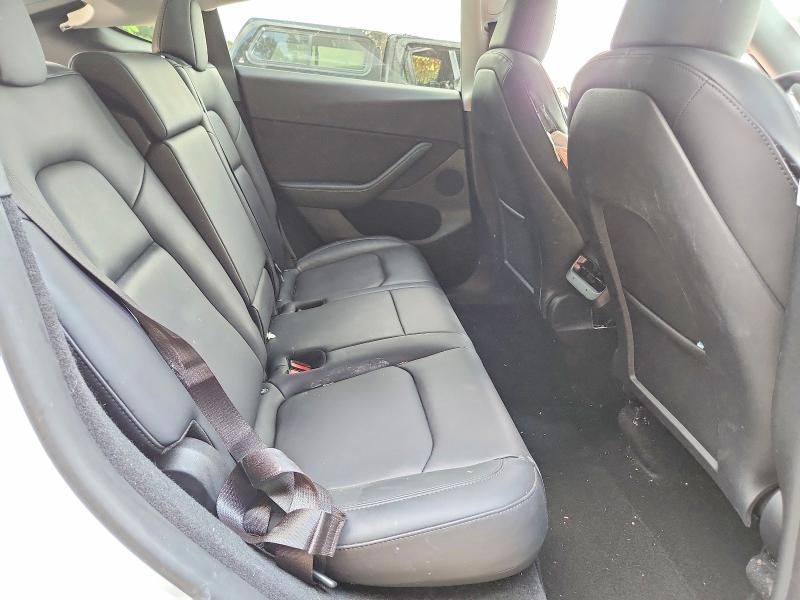 Photo 11 from auction – 2023 TESLA MODEL Y with VIN 7SAYGDED2PF915223
