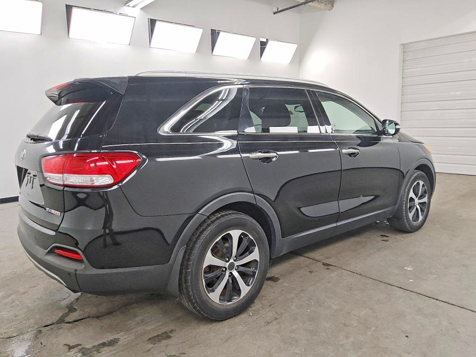 Photo 3 from auction – 2016 KIA SORENTO with VIN 5XYPH4A17GG019039