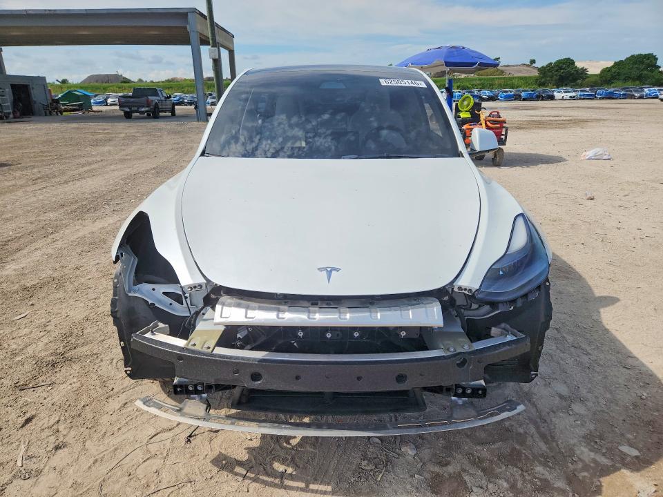 Photo 5 from auction – 2023 TESLA MODEL Y with VIN 7SAYGDEE2PF752839