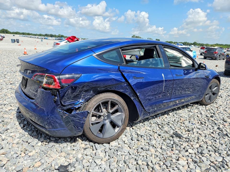 Photo 3 from auction – 2022 TESLA MODEL 3 with VIN 5YJ3E1EB9NF233172