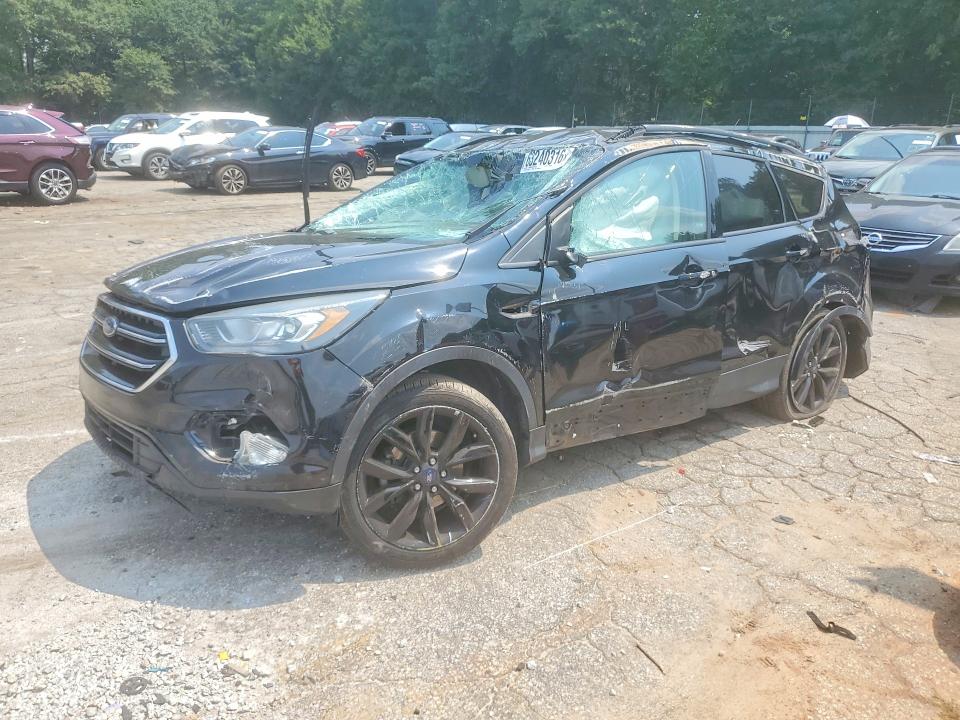 FORD ESCAPE 2017 with VIN 1FMCU0GD8HUC47390 - Photo from auction