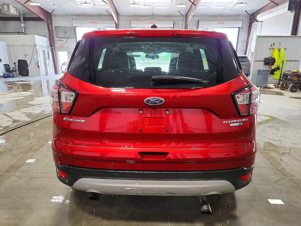 Photo 6 from auction – 2017 FORD ESCAPE with VIN 1FMCU9J96HUD56536