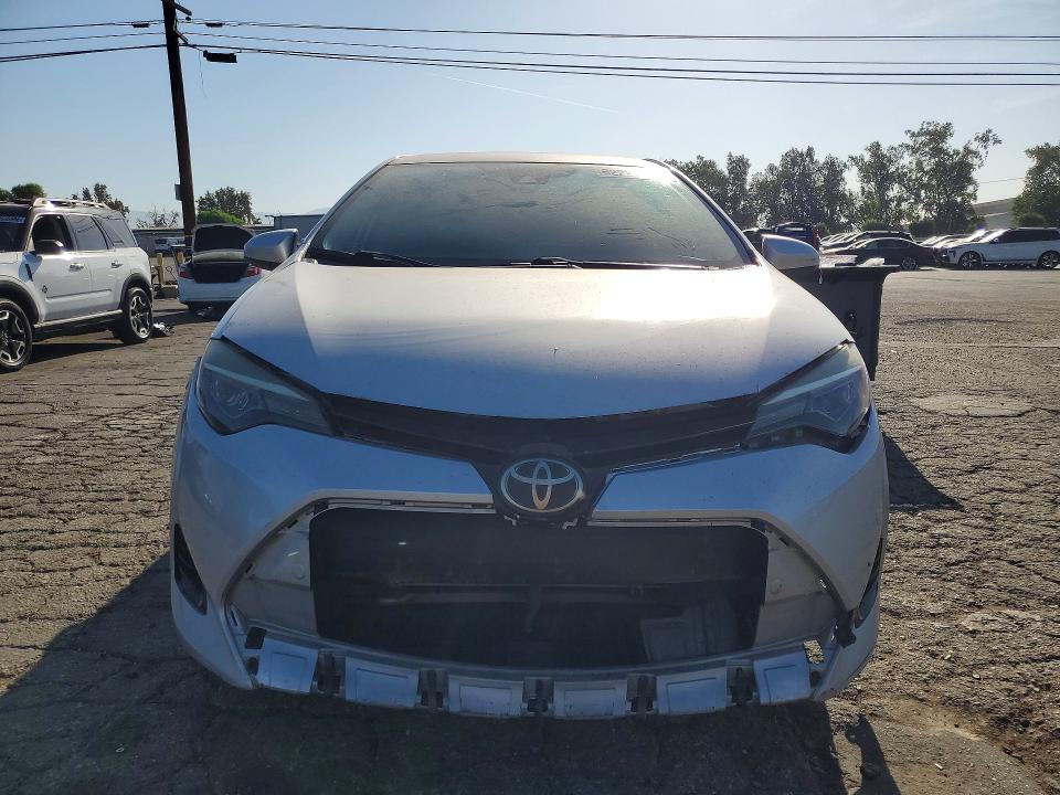 Photo 5 from auction – 2018 TOYOTA COROLLA with VIN 5YFBURHE7JP797484