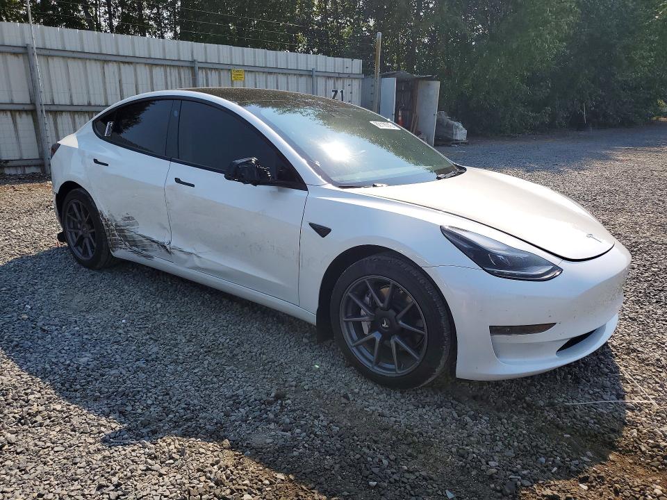 Photo 4 from auction – 2023 TESLA MODEL 3 with VIN 5YJ3E1EA4PF577969
