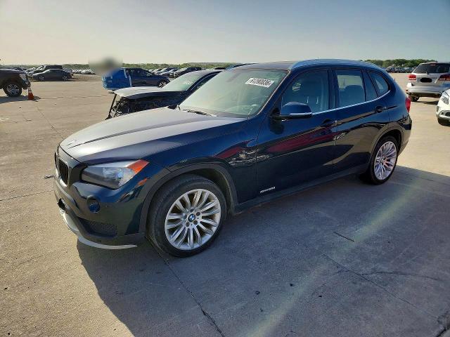 BMW X1 2015 with VIN WBAVM1C52FVZ93761 - Photo from auction