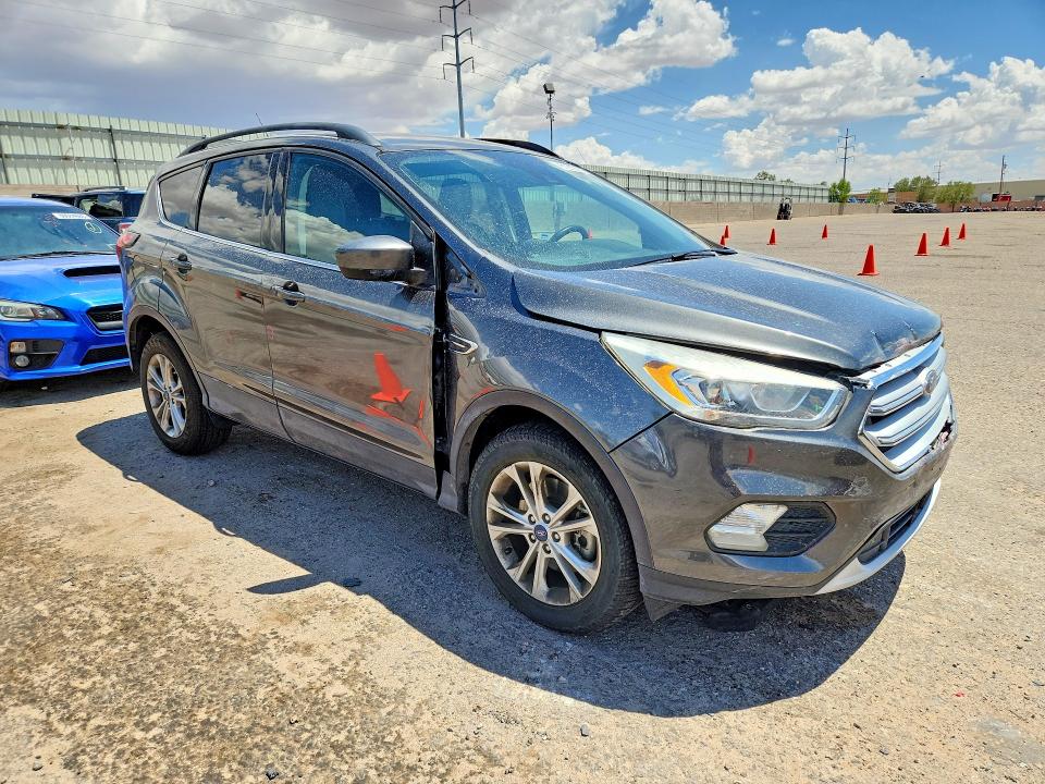 Photo 4 from auction – 2019 FORD ESCAPE with VIN 1FMCU9HD1KUA35182