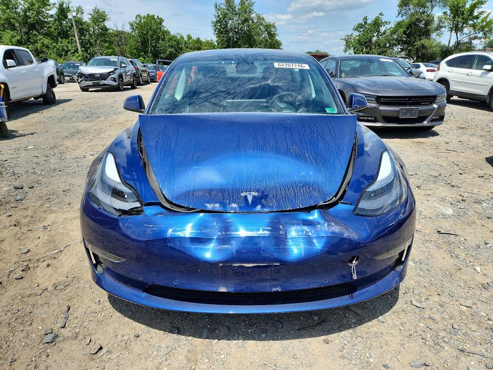 Photo 5 from auction – 2021 TESLA MODEL 3 with VIN 5YJ3E1EB2MF049593