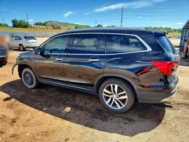 Photo 2 from auction – 2016 HONDA PILOT with VIN 5FNYF6H03GB100940