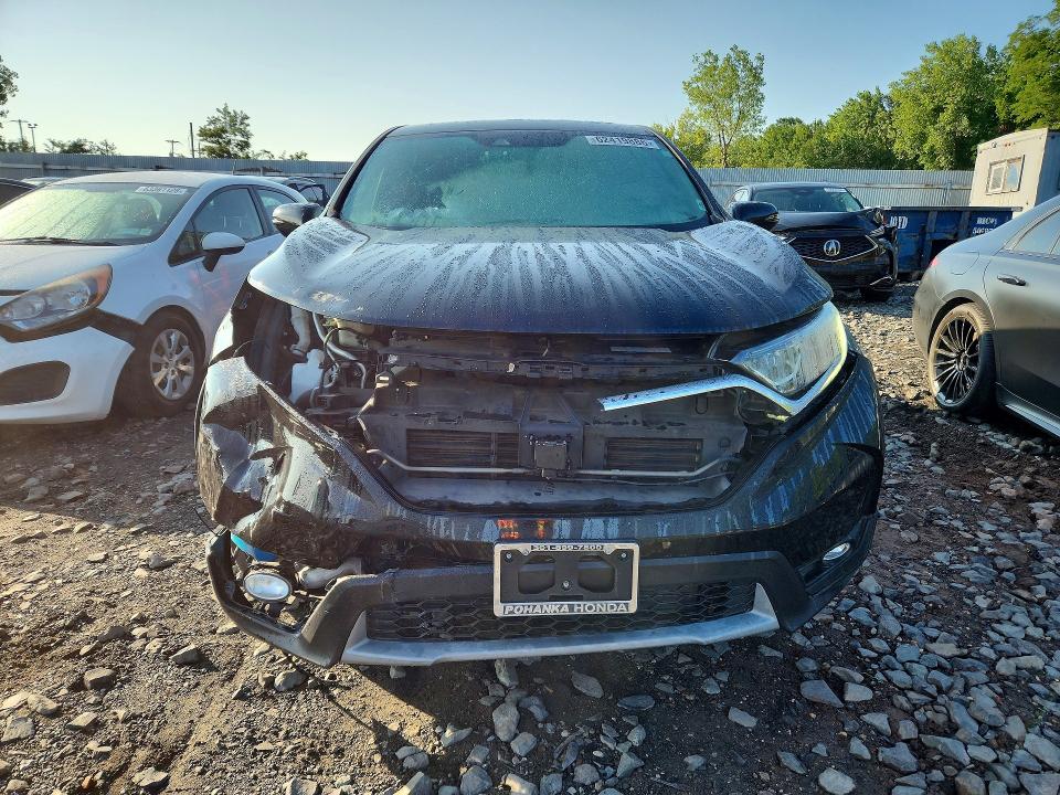 Photo 5 from auction – 2018 HONDA CR-V with VIN 2HKRW2H53JH677470