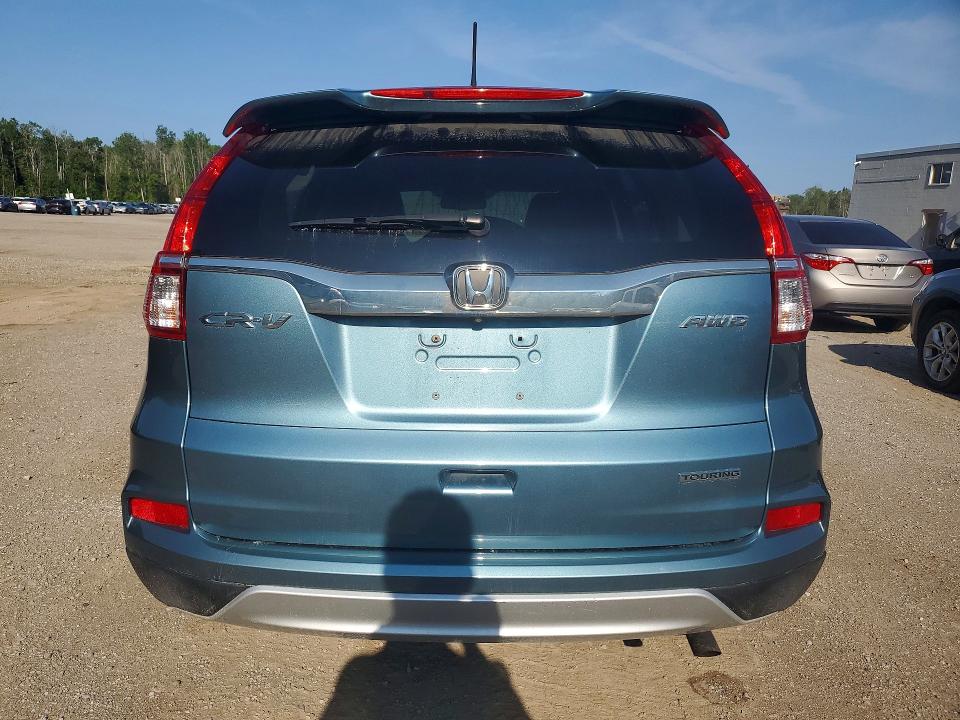 Photo 6 from auction – 2016 HONDA CR-V with VIN 5J6RM4H99GL802443