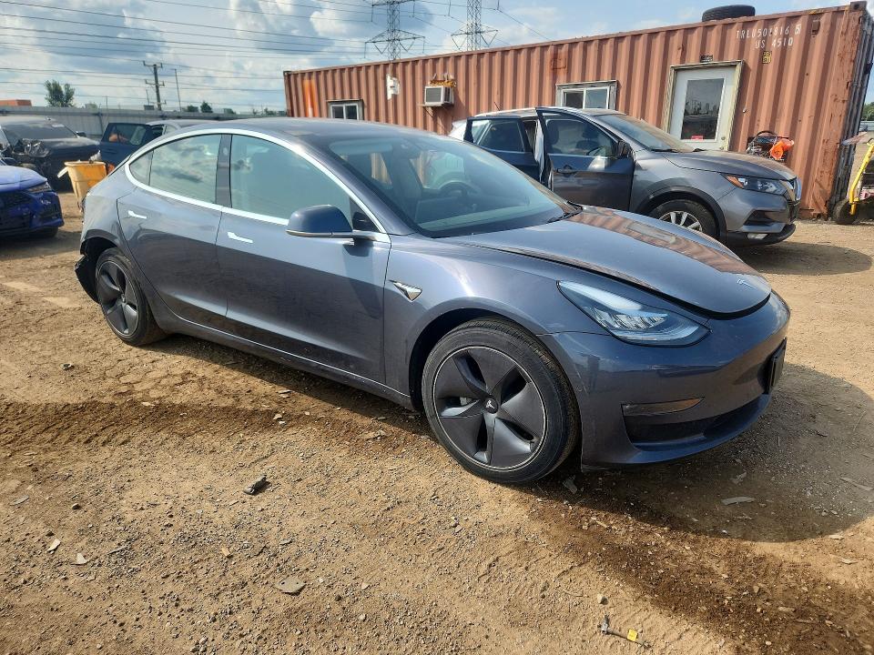 Photo 4 from auction – 2018 TESLA MODEL 3 with VIN 5YJ3E1EA7JF043288