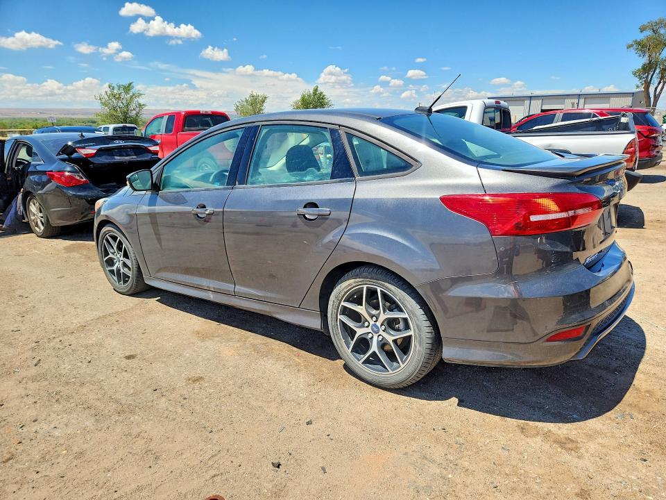 Photo 2 from auction – 2016 FORD FOCUS with VIN 1FADP3F22GL245971
