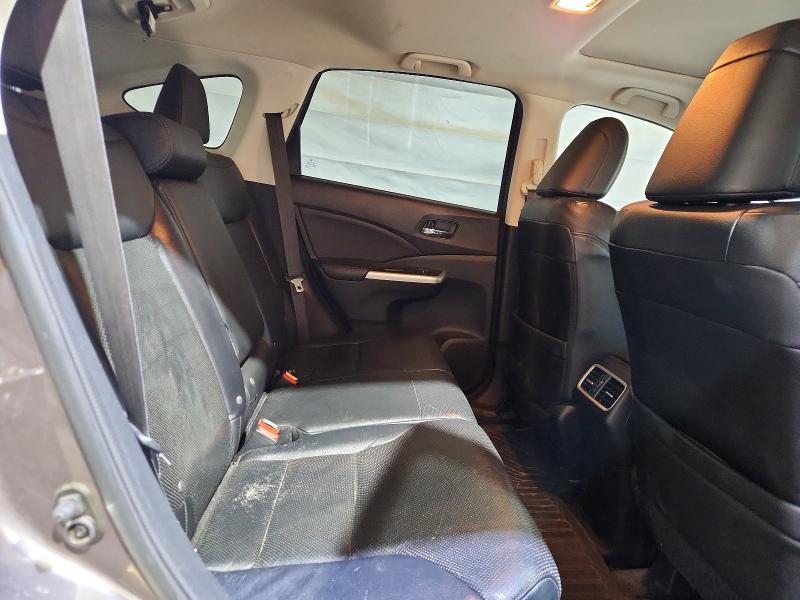 Photo 11 from auction – 2015 HONDA CR-V with VIN 2HKRM4H72FH635835