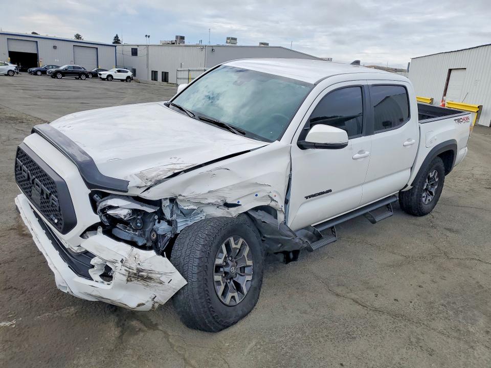 TOYOTA TACOMA 2023 with VIN 3TMCZ5AN2PM606594 - Photo from auction