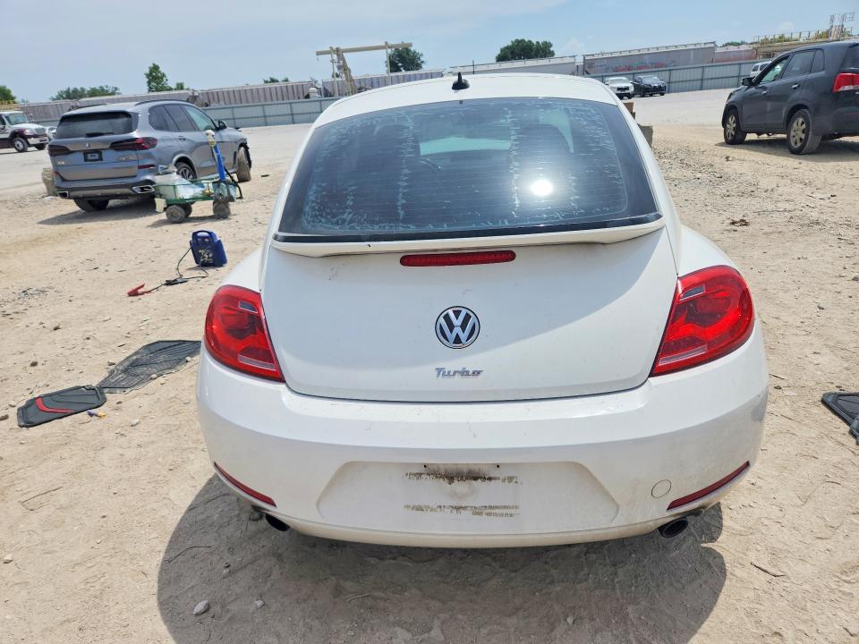 Photo 6 from auction – 2012 VOLKSWAGEN BEETLE with VIN 3VWVA7AT9CM643885