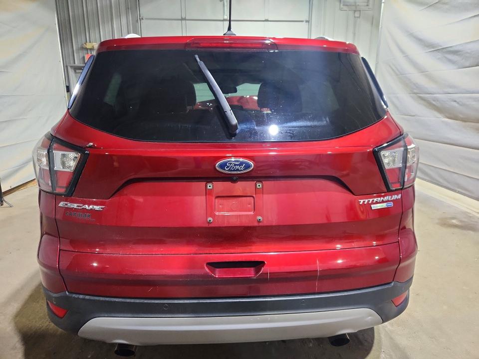 Photo 6 from auction – 2018 FORD ESCAPE with VIN 1FMCU9J98JUA45938