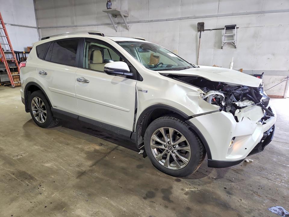 Photo 4 from auction – 2016 TOYOTA RAV4 HV with VIN JTMDJREV0GD032103