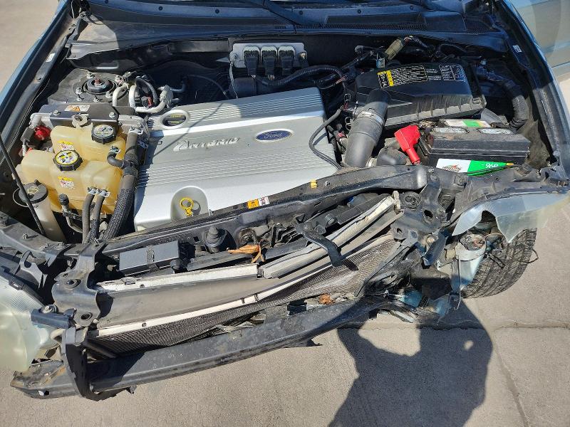 Photo 12 from auction – 2006 FORD ESCAPE with VIN 1FMCU96HX6KA25886