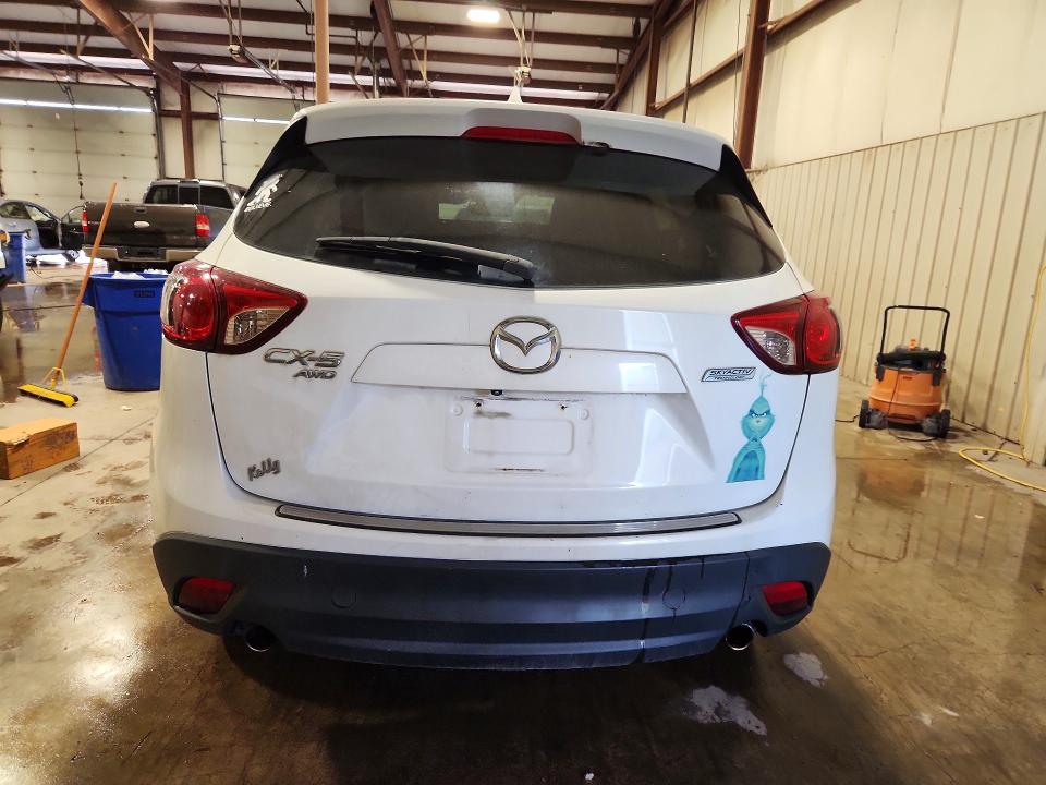 Photo 6 from auction – 2014 MAZDA CX-5 with VIN JM3KE4CY0E0381818