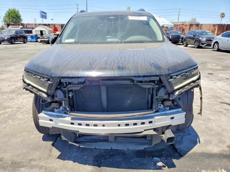 Photo 5 from auction – 2025 HONDA PILOT with VIN 5FNYG2H70SB014481