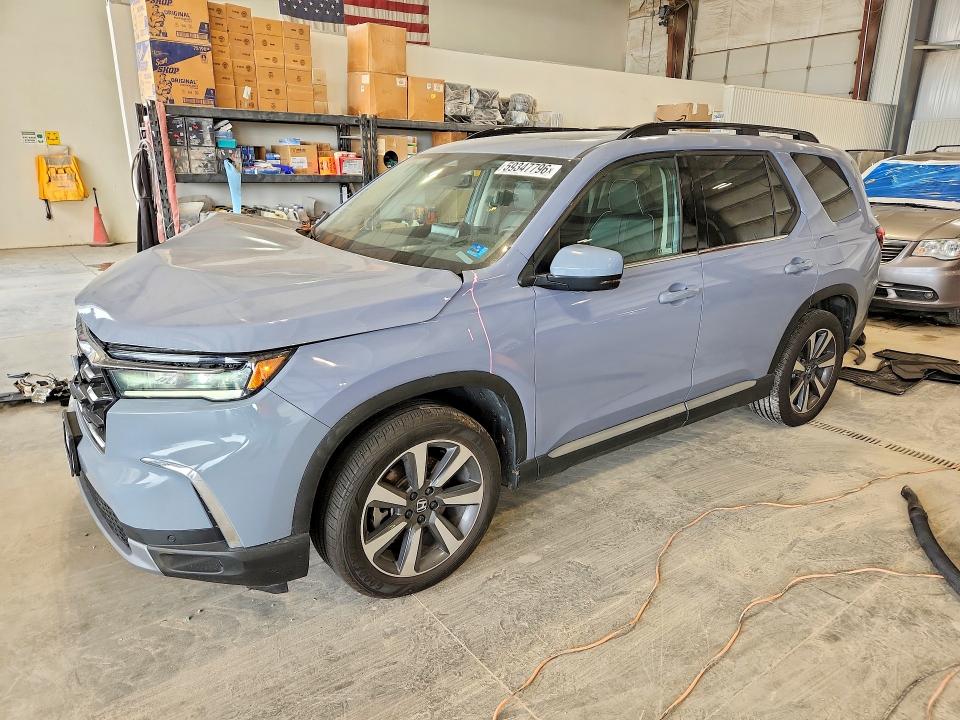HONDA PILOT 2023 with VIN 5FNYG1H89PB043049 - Photo from auction