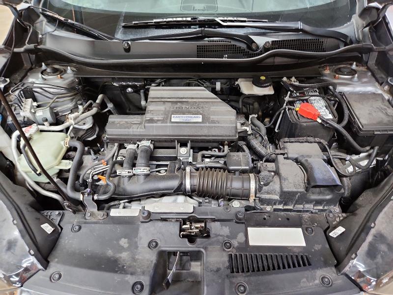 Photo 12 from auction – 2018 HONDA CR-V with VIN 7FARW2H51JE089649