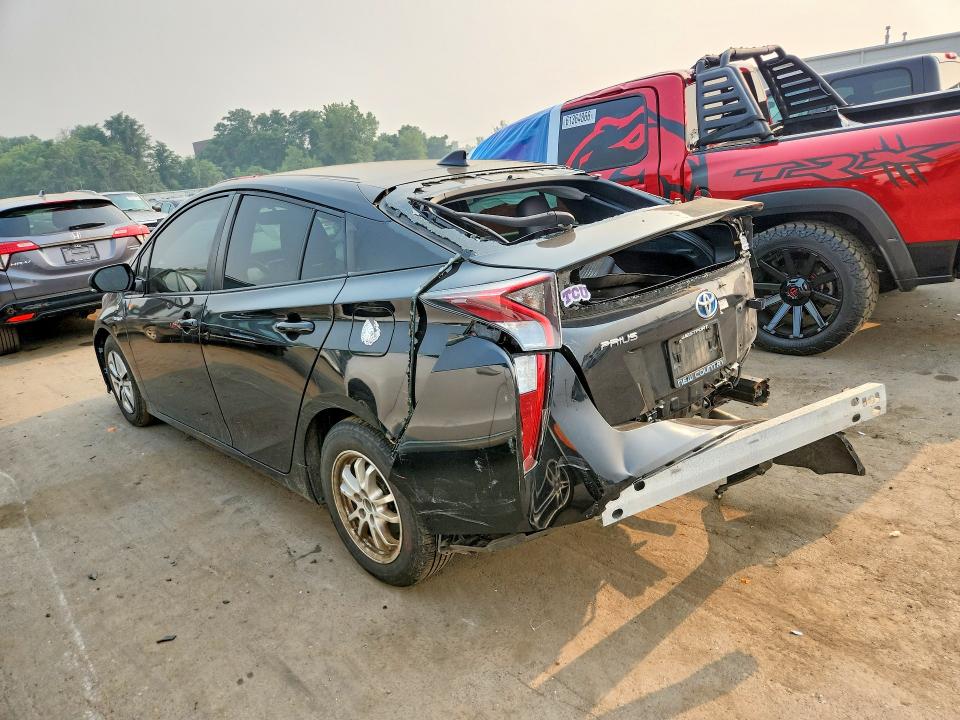Photo 2 from auction – 2016 TOYOTA PRIUS with VIN JTDKARFUXG3026697