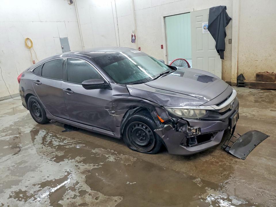 Photo 4 from auction – 2018 HONDA CIVIC with VIN 19XFC2F57JE002076