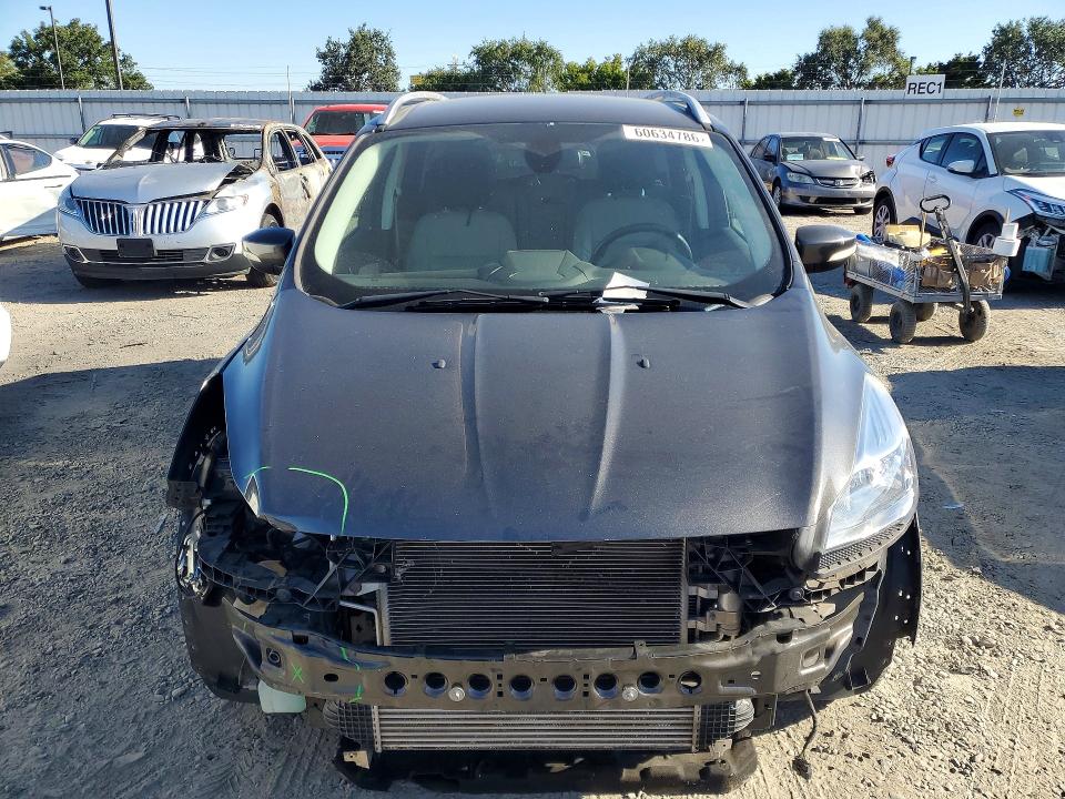 Photo 5 from auction – 2015 FORD ESCAPE with VIN 1FMCU0J92FUB31734