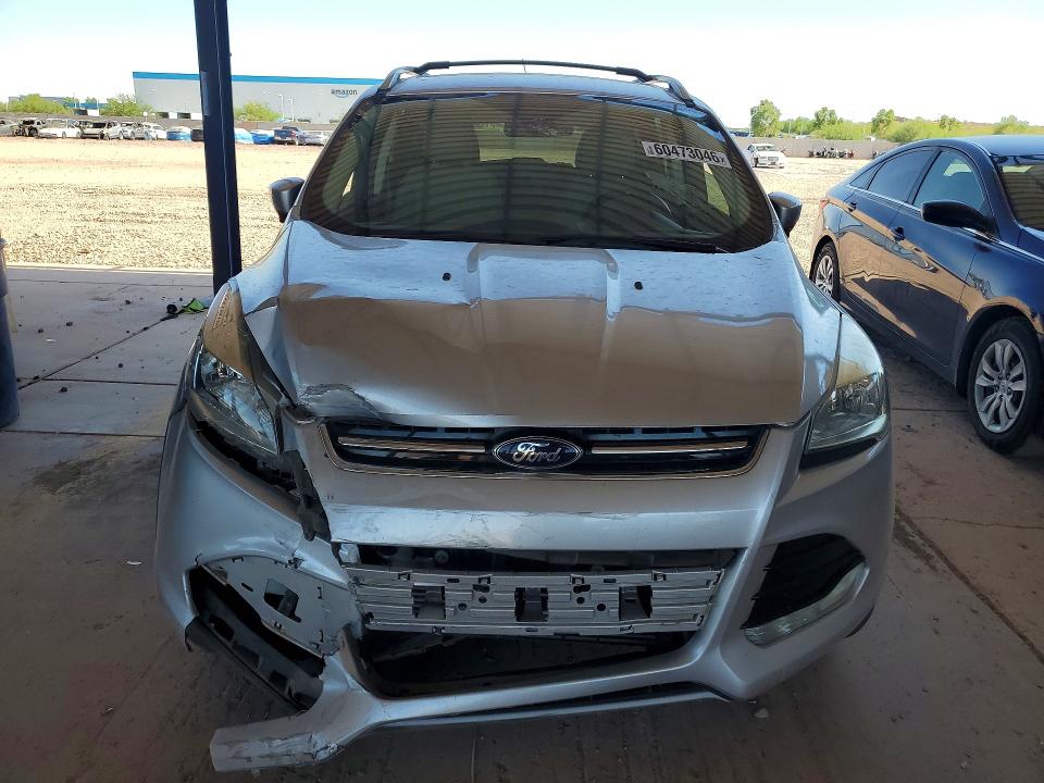 Photo 5 from auction – 2016 FORD ESCAPE with VIN 1FMCU0J96GUB15862