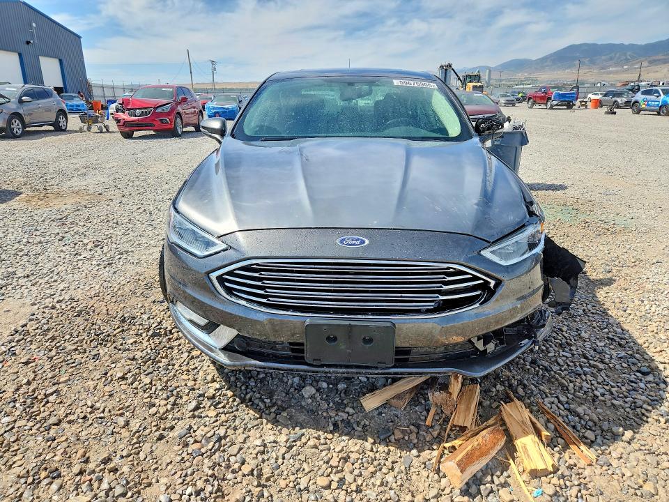 Photo 5 from auction – 2017 FORD FUSION with VIN 3FA6P0T91HR200838