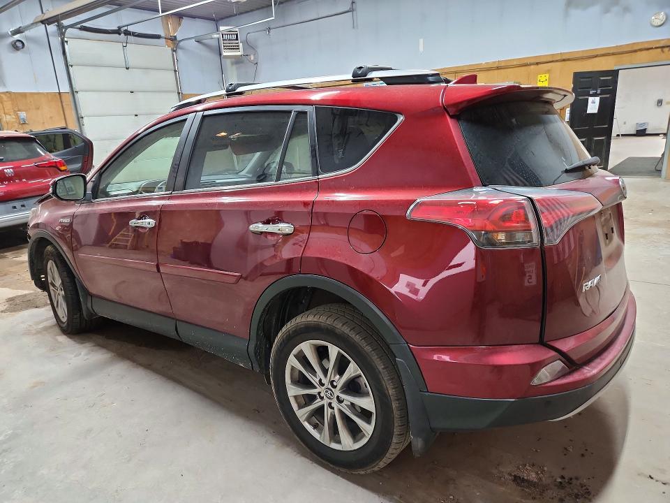Photo 2 from auction – 2018 TOYOTA RAV4 HV with VIN JTMDJREV9JD176045