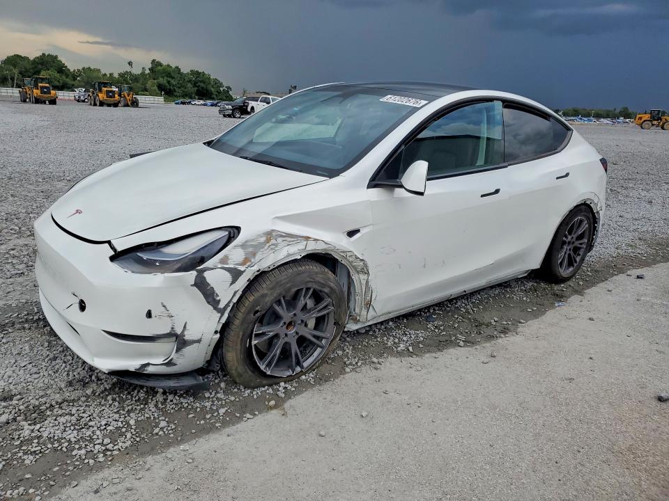 TESLA MODEL Y 2024 с VIN 7SAYGDED6RA326191 - Фото с аукциона