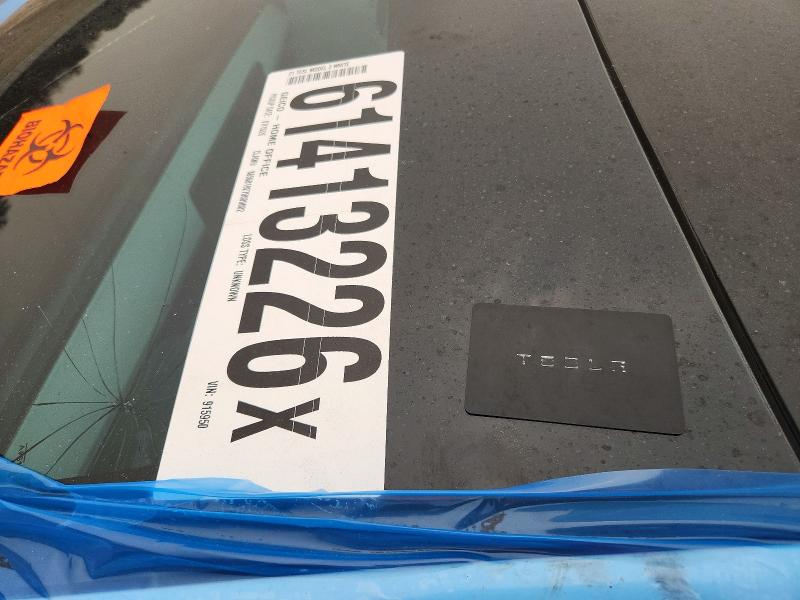 Photo 12 from auction – 2021 TESLA MODEL 3 with VIN 5YJ3E1EA4MF915950