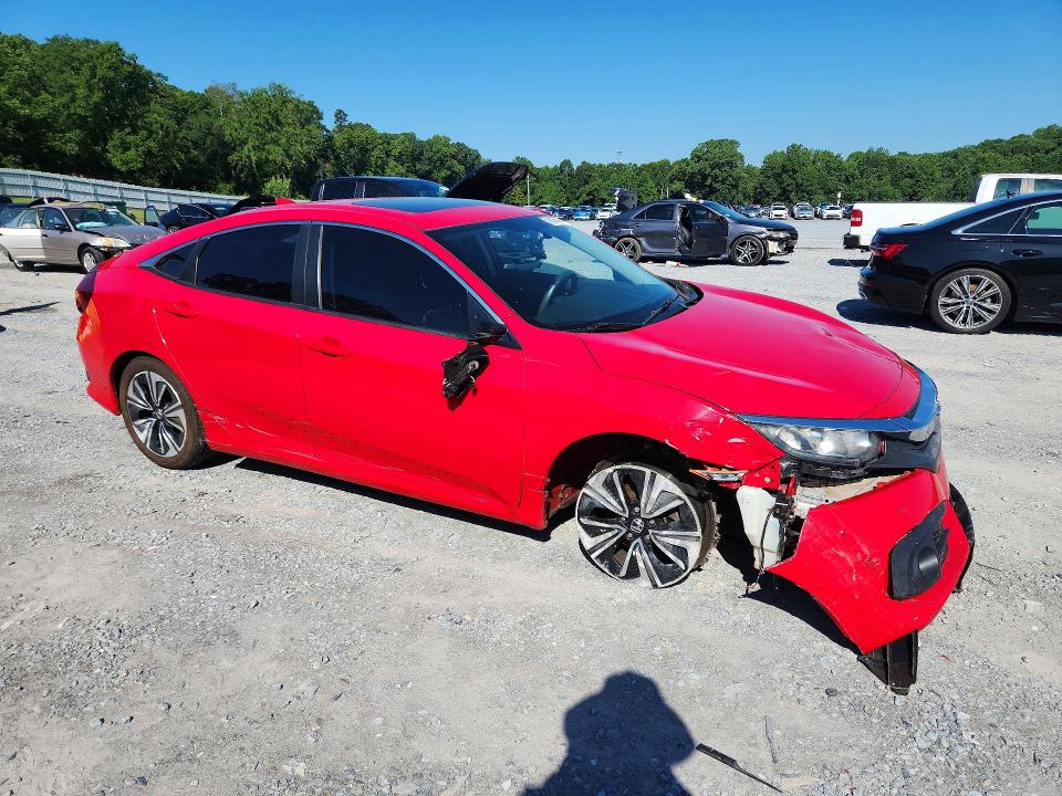 Photo 4 from auction – 2016 HONDA CIVIC with VIN 2HGFC1F31GH640184