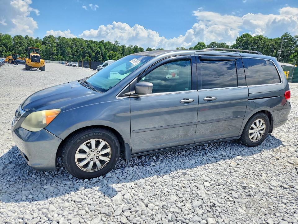 HONDA ODYSSEY 2010 with VIN 5FNRL3H43AB064821 - Photo from auction
